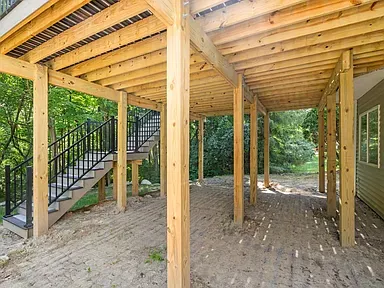 Under-deck framing and structural support system for elevated deck in Ann Arbor Fire Fox subdivision