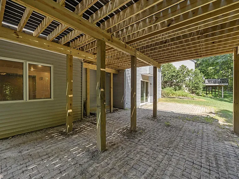 Under-deck support posts and joist system for elevated deck construction in Ann Arbor MI