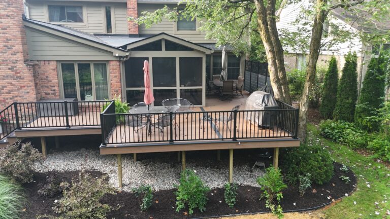 Elevated composite deck with aluminum railing in Abbey Knoll Estates Northville Michigan