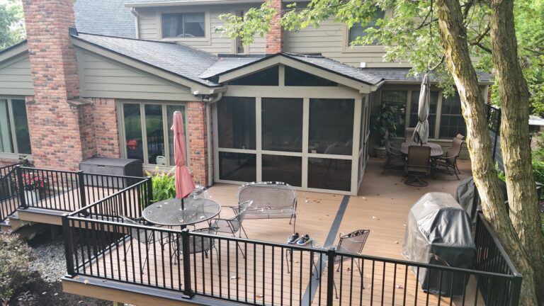 Composite deck with black aluminum railing in Abbey Knoll Estates Northville Michigan