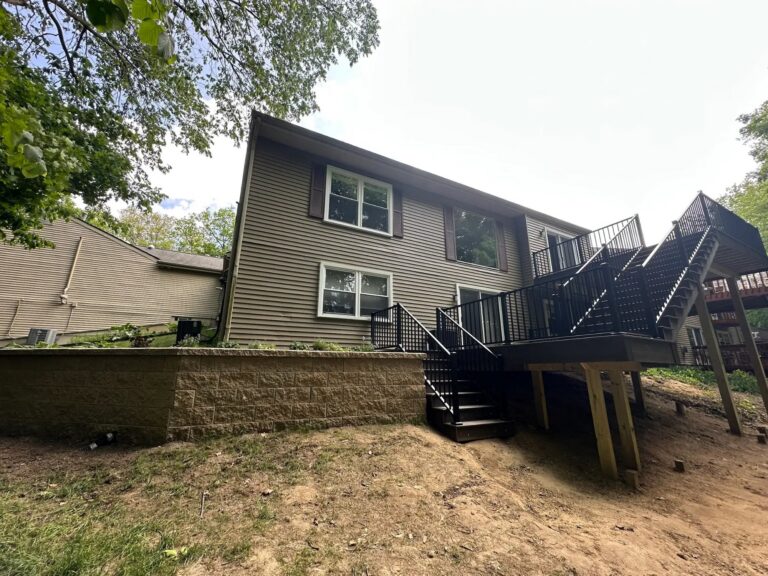 Trex composite deck with aluminum railing and staircase in the Northridge Villas subdivision in Northville Michigan.