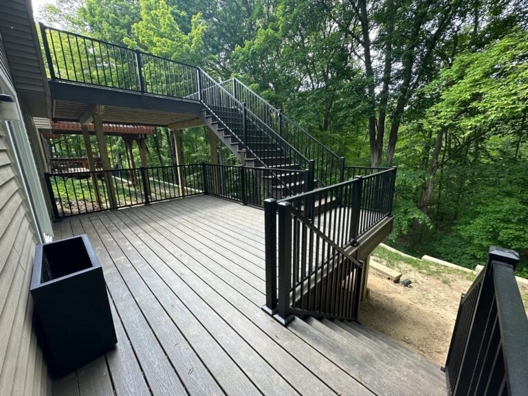 Trex Enhance composite decking with black aluminum railing in Northridge Villas subdivision Northville Michigan.