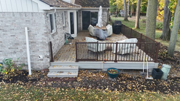 Backyard composite deck with aluminum railing Deerbrook Subdivision Novi Michigan