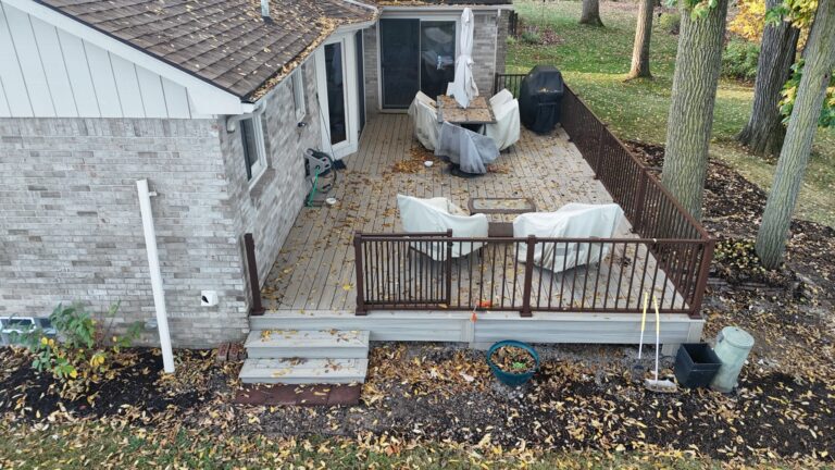 Composite deck outdoor living space Deerbrook Subdivision Novi MI Titan Decks