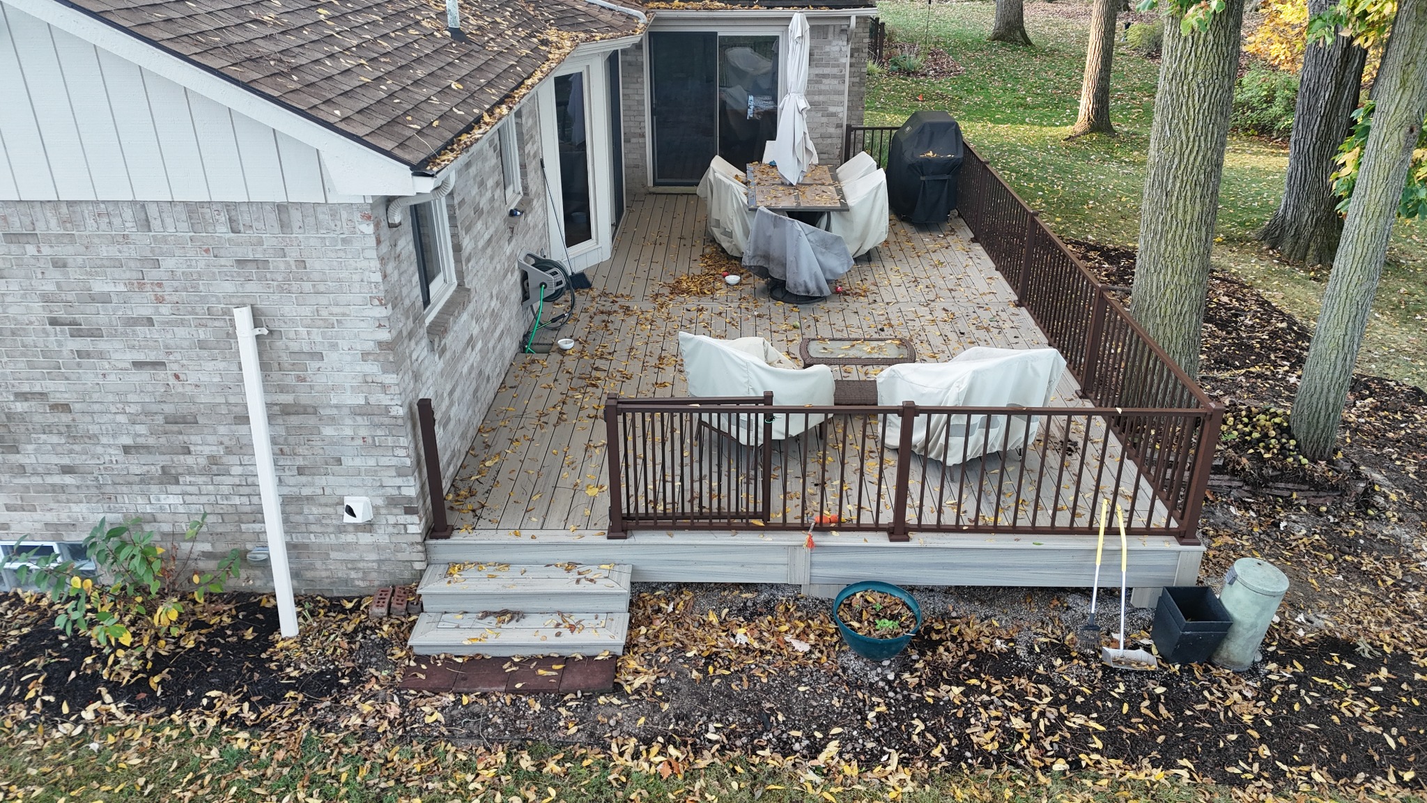 Composite deck outdoor living space Deerbrook Subdivision Novi MI Titan Decks