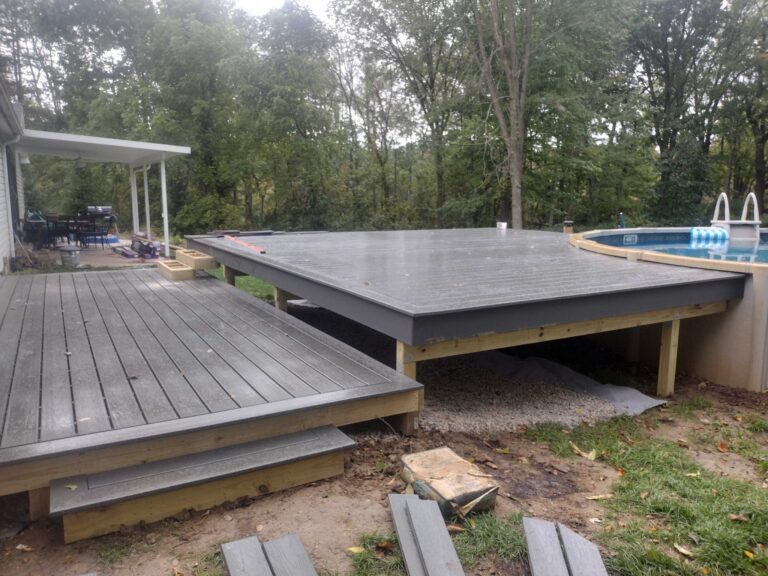 Composite decking installed on pool deck in Salem Township MI before railing installation