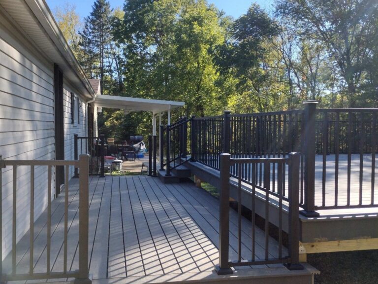 House side view of composite pool deck project in Salem Township MI