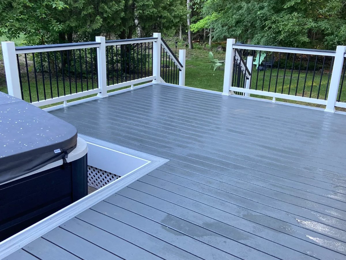 composite deck with black aluminum railing and stairs west bloomfield woods west bloomfield mi