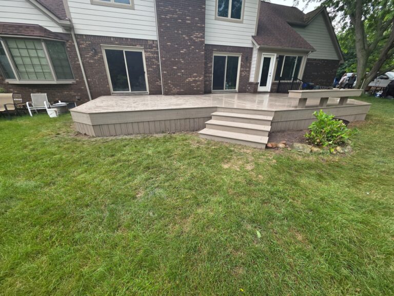 Rear view of completed Deckorators composite deck renovation in Milford, Michigan
