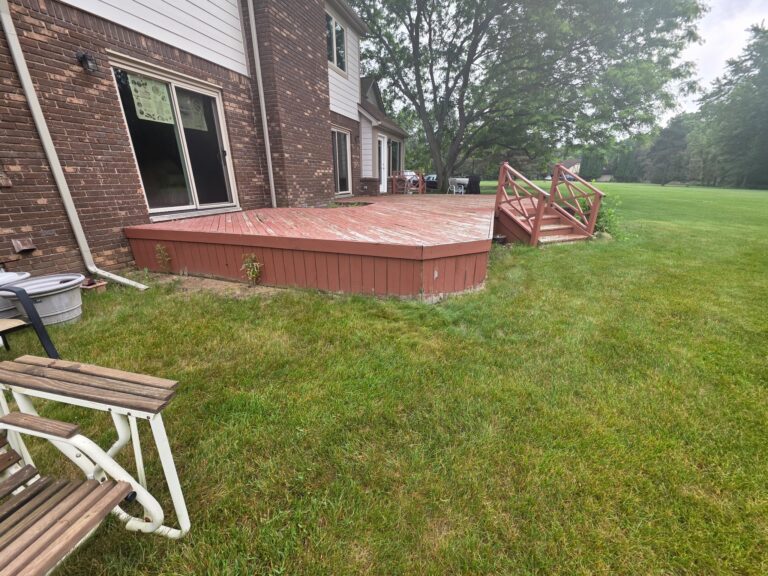 Original painted wood deck before composite resurfacing in Old Milford Farms, Milford, Michigan