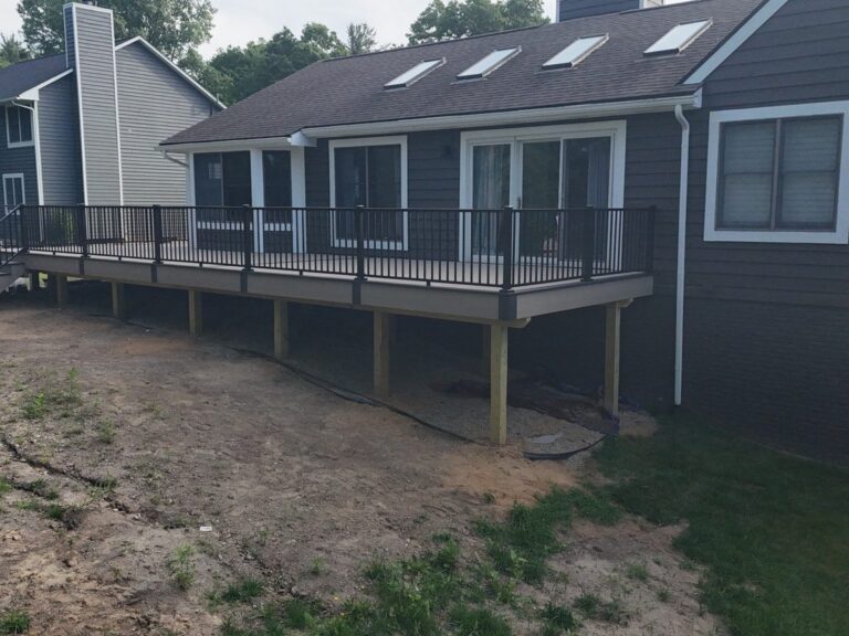 Black Trex Signature aluminum railings on Deckorators composite deck in Green Oak Township Michigan